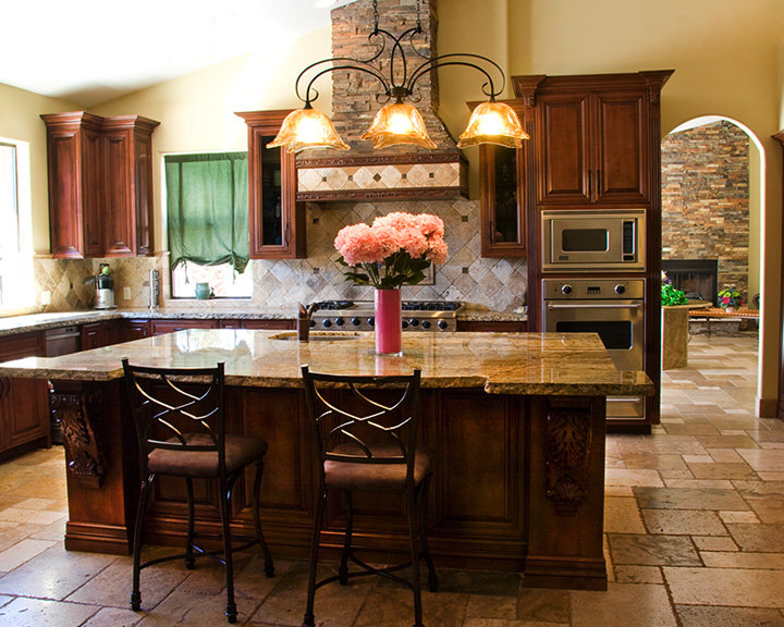Modern community kitchen with stainless steel appliances and ample counter space